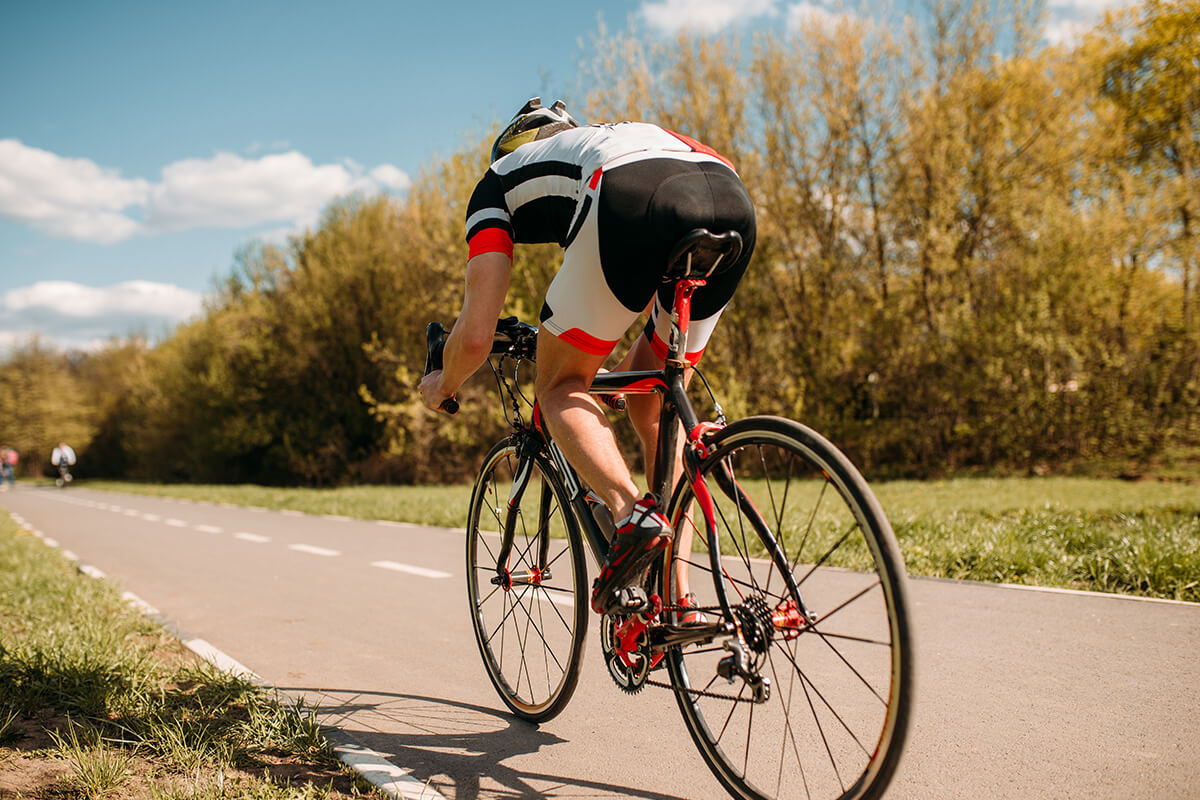 Cyclist rides on bicycle speed effect